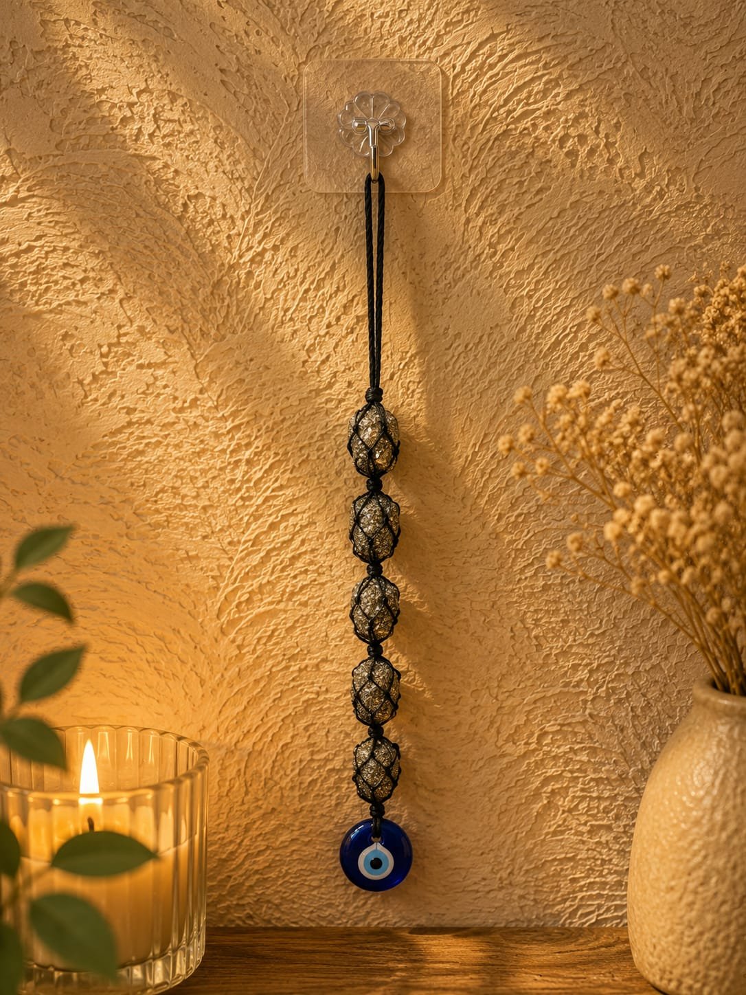 Raw pyrite hanger with evil eye
